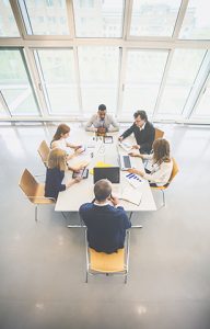group of people at conference table