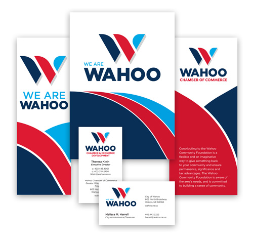 Branding posters and business cards for WAHOO Chamber of Commerce featuring red, blue, and light blue swoosh logo and bold 'WAHOO' text.